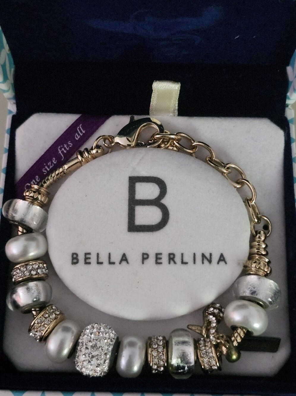 bella Perlina Gold Tone Bracelet with White Pearlescent & Crystal Charms